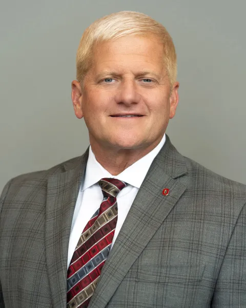 Dean of The Ohio State University College of Veterinary Medicine and nationally respected veterinary leader who had spent decades studying and living the human–animal bond, but had never formalized that work into a single, accessible body of thought.